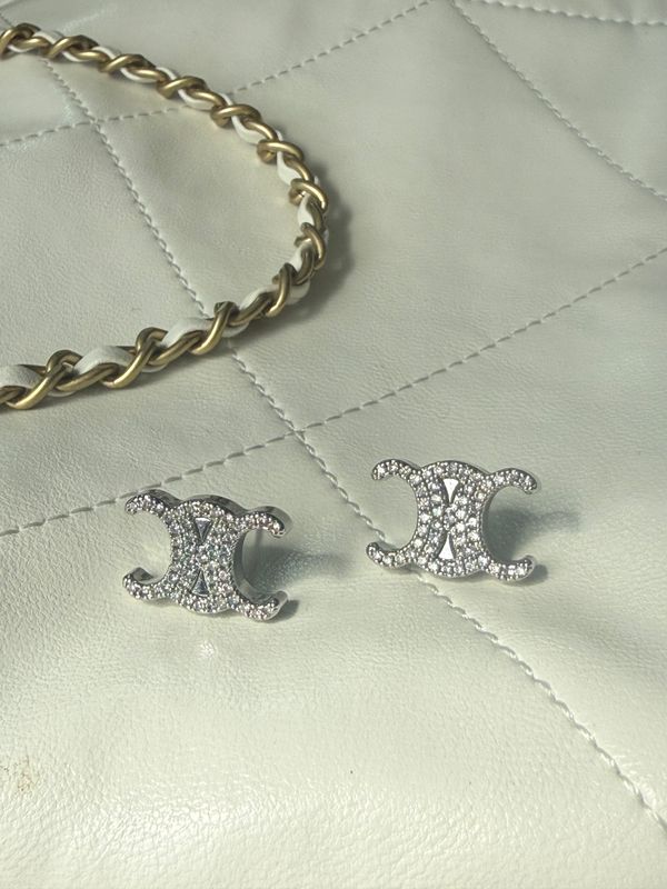 Delicate silver tone reworked earrings