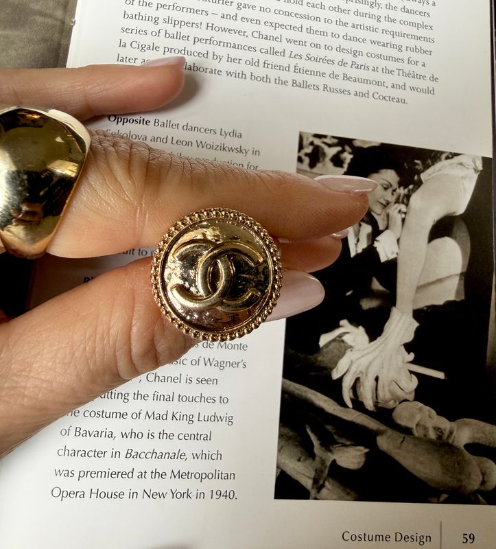 Timeless gold tone button ring