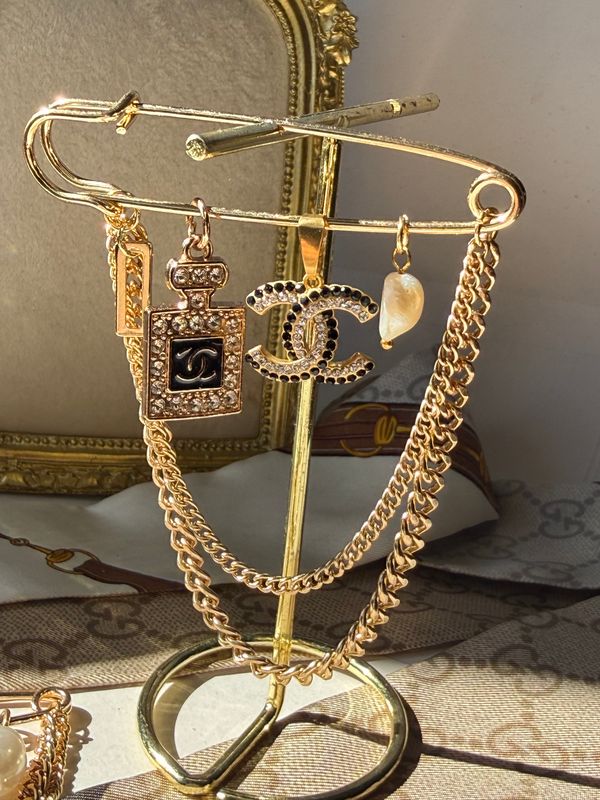 Parisian Gold Emblem Brooch