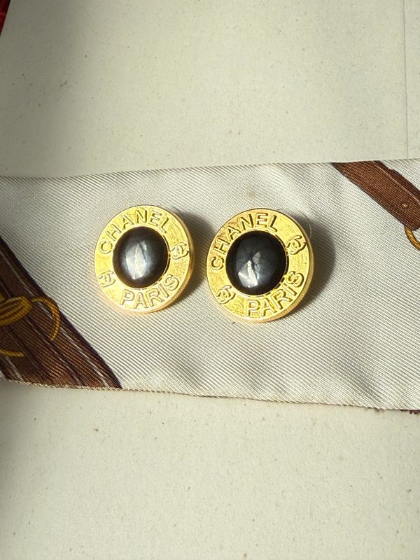Iconic Paris-Inspired Gold Button Earrings with Black Stone Center