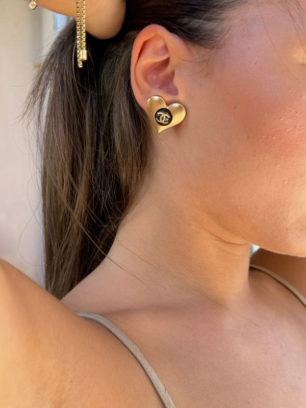 Golden matte tone heart statement earrings