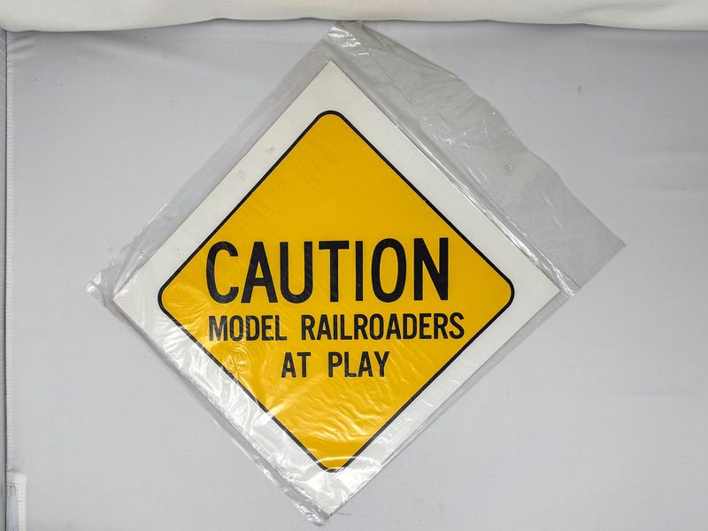 Caution Model Railroaders at Play Sign