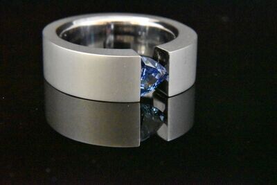 Tension set Ring with Sapphire in Platinum