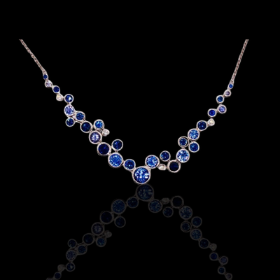 Custom made Sapphires, Tanzanites, and Diamond necklace in 18KWG