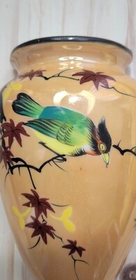 Peachy iridescent bird wall pocket