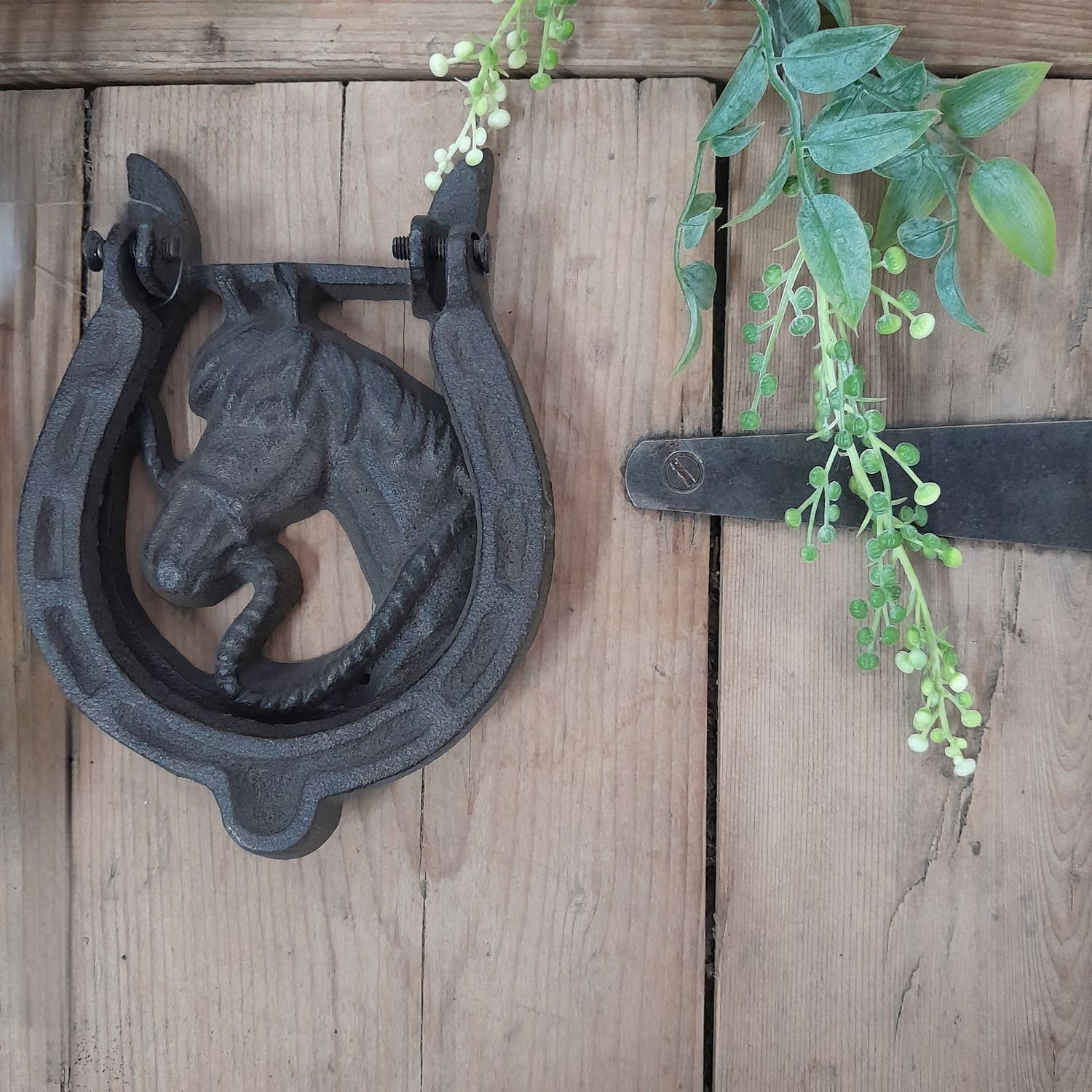 Cast iron horse door knocker