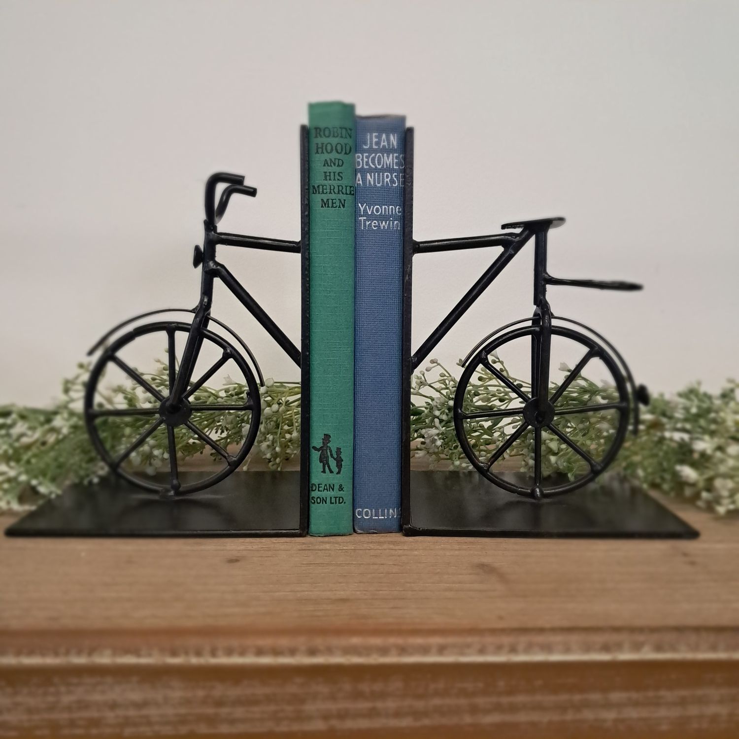 Black metal bicycle bookends