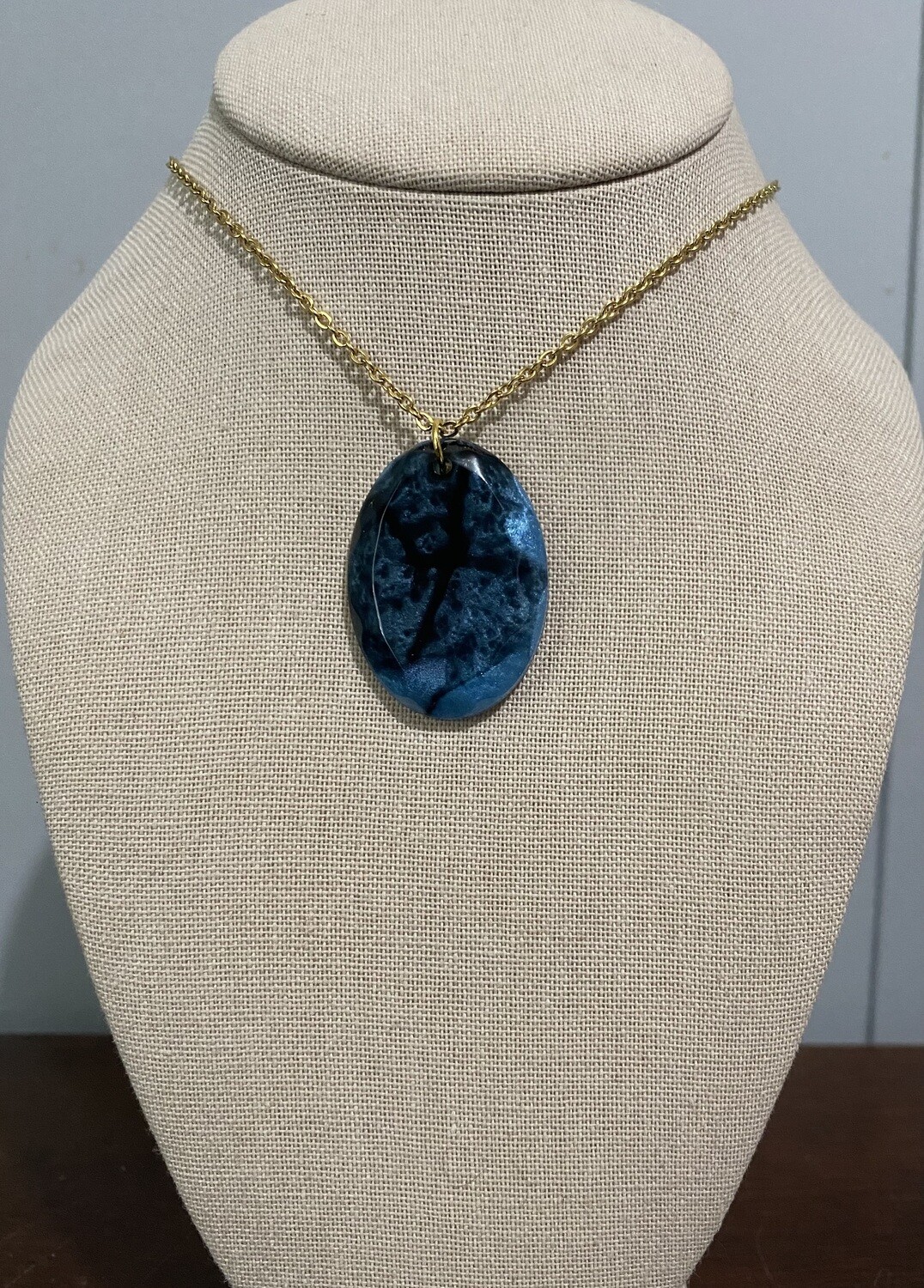 Blue and Black Oval