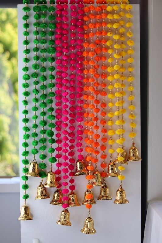 ​Pompom Thoran with big gold bell
