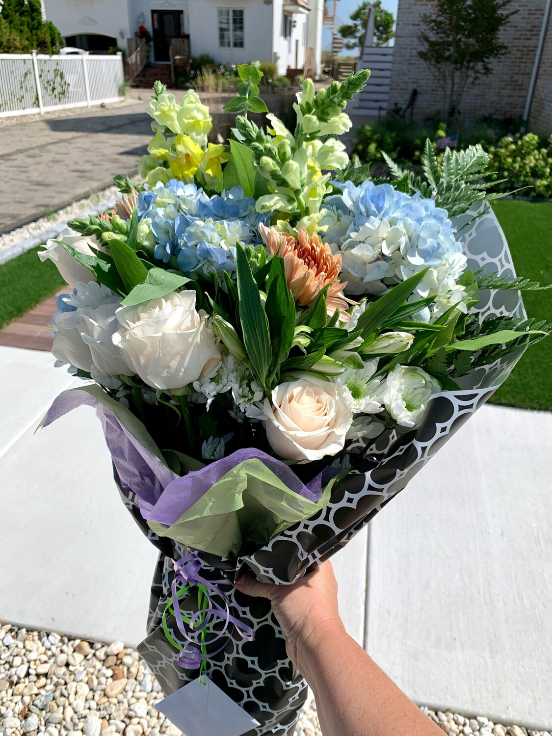 $140 Seasonal Wrapped Fresh Flower Bouquet (no vase)