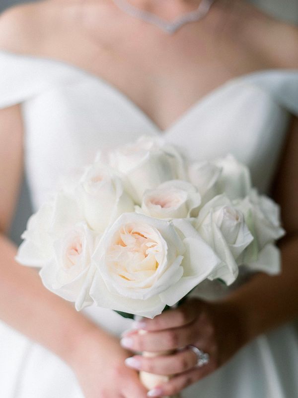 a wedding bouquet for a cape may wedding featuring fresh white garden roses, open and fragrant for a bride&#39;s wedding day