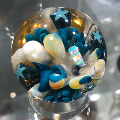 Starburst Implosion Marble With Opal 1.5”