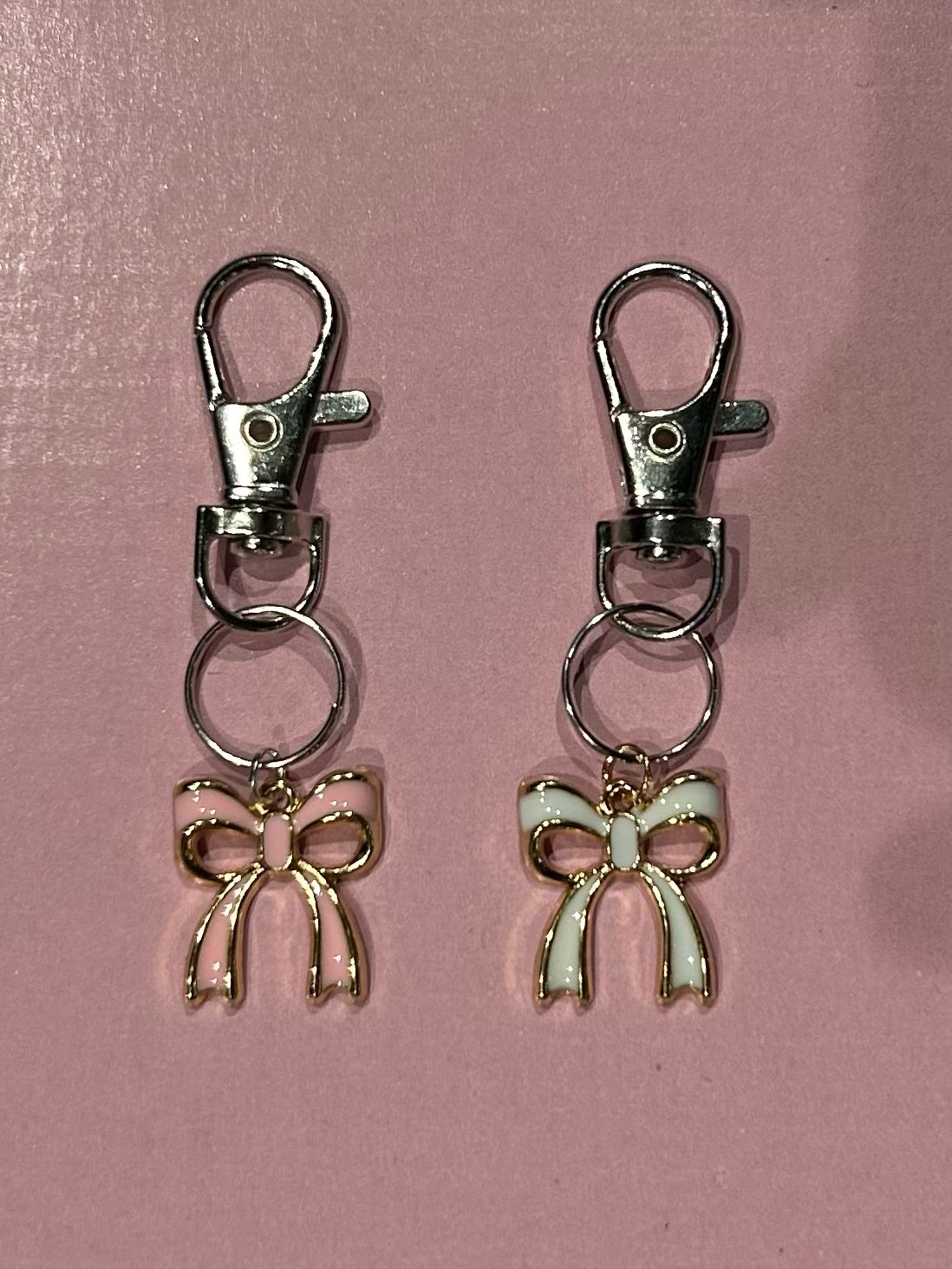 Pink and white bow charms