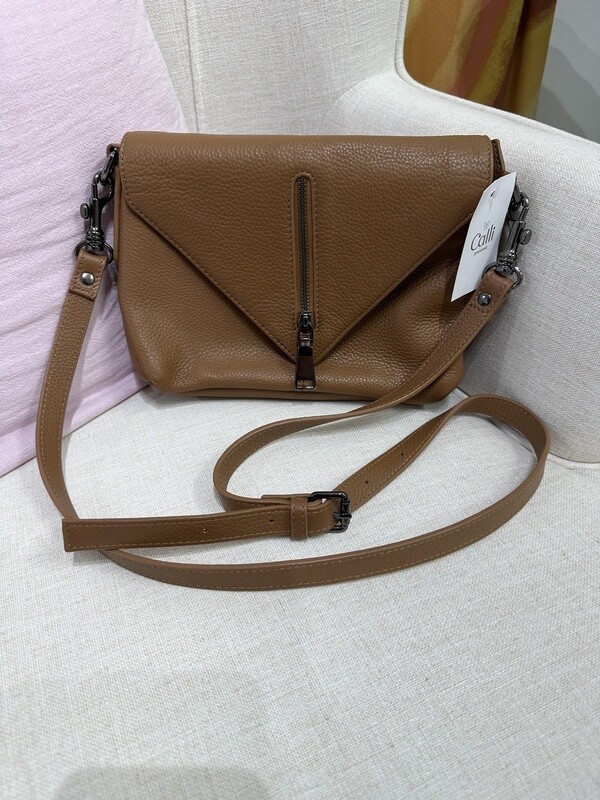 status anxiety brown leather bag