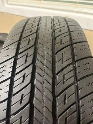 SET OF 4 USED HIGH TREAD 2256517 102H UNIROYAL TIGER PAW TOURING A/S