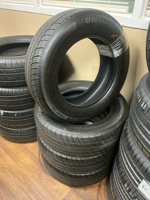 SET OF 4 USED HIGH TREAD 2256517 102H UNIROYAL TIGER PAW TOURING A/S