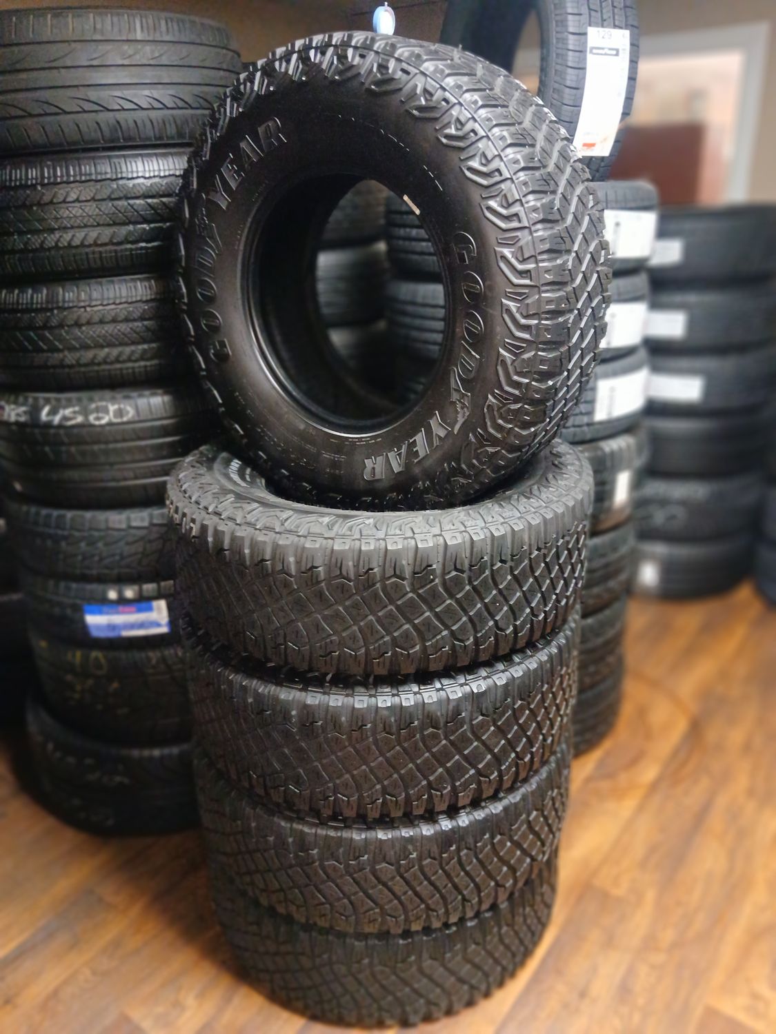 SET OF 4 + 1 GOOD USED LT 3157017 GOODYEAR WRANGLER TERRITORY MT 113/110S