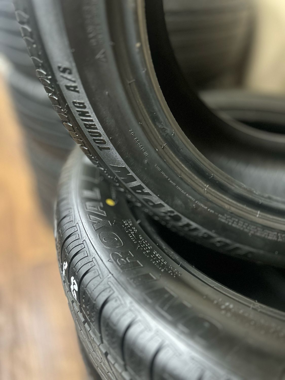 SET OF 4 USED HIGH TREAD 2355518 UNIROYAL TIGERPAW TOURING A/S DT 100V 9.5/32NDS