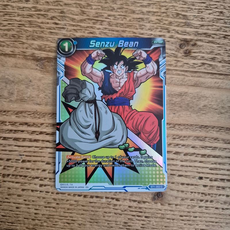BT1-053 Senzu Bean (C)(Foil) Dragon Ball Super: Galactic Battle BT1-053 Senzu Bean (C)(Foil) Dragon Ball Super: Galactic Battle