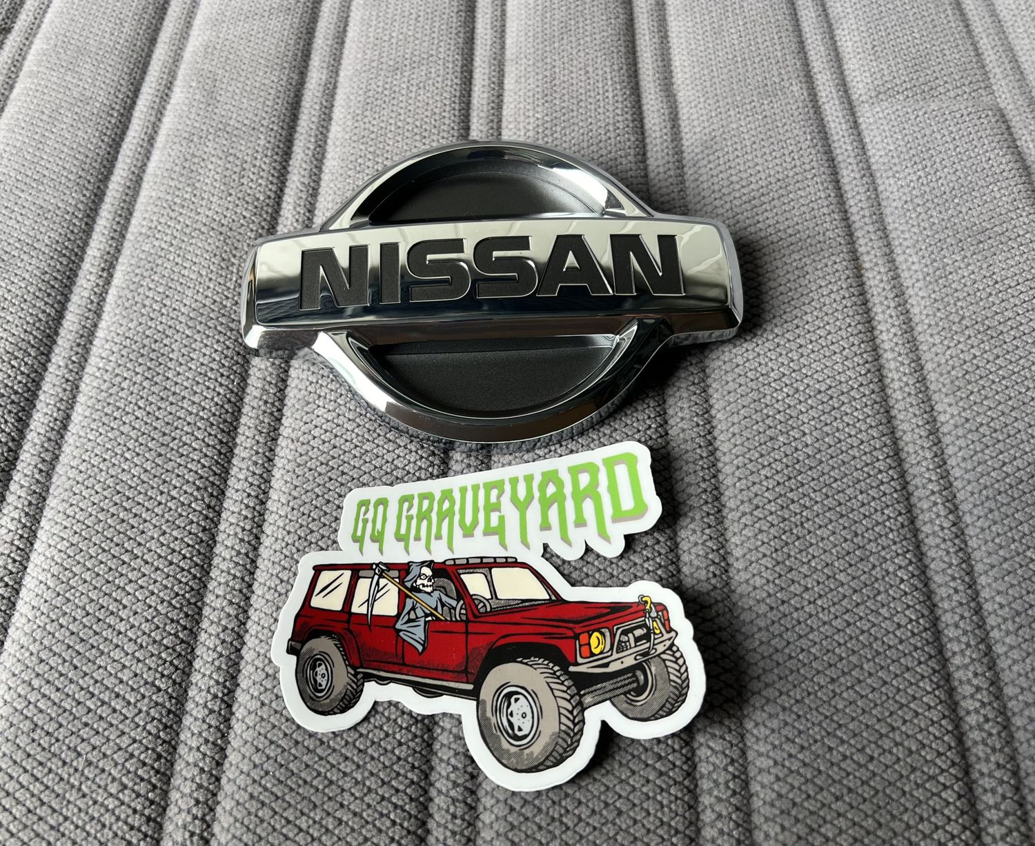 Genuine Nissan Series 1&amp;2 Grille Badge GU Y61