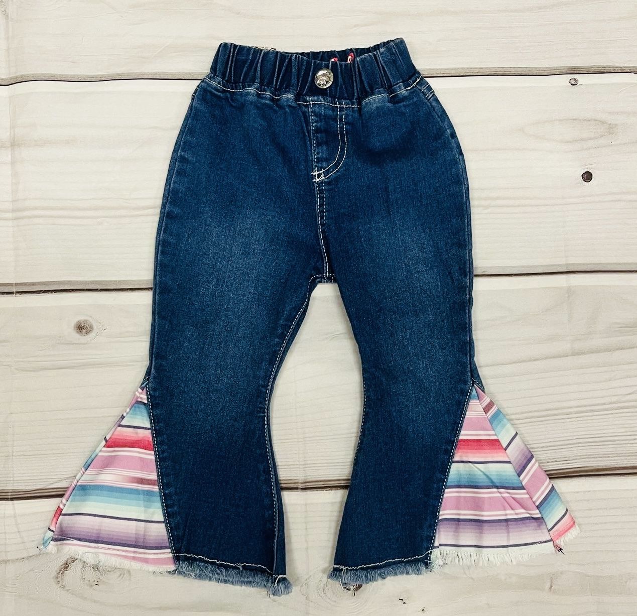 802101-455 TODDLER COWGIRL HARDWARE SERAPE BELLS