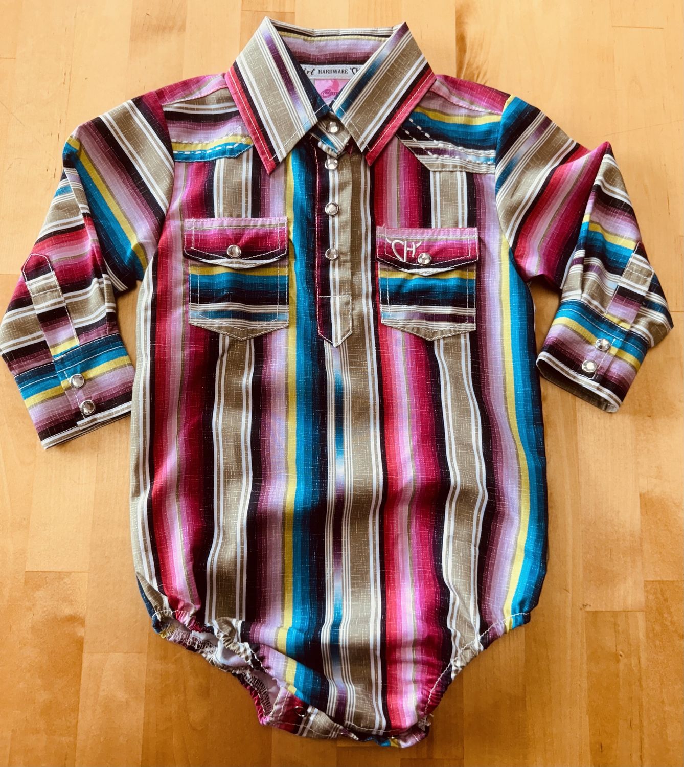 FP21 INFANT COWGIRL HARDWARE SERAPE L/S ROMPER