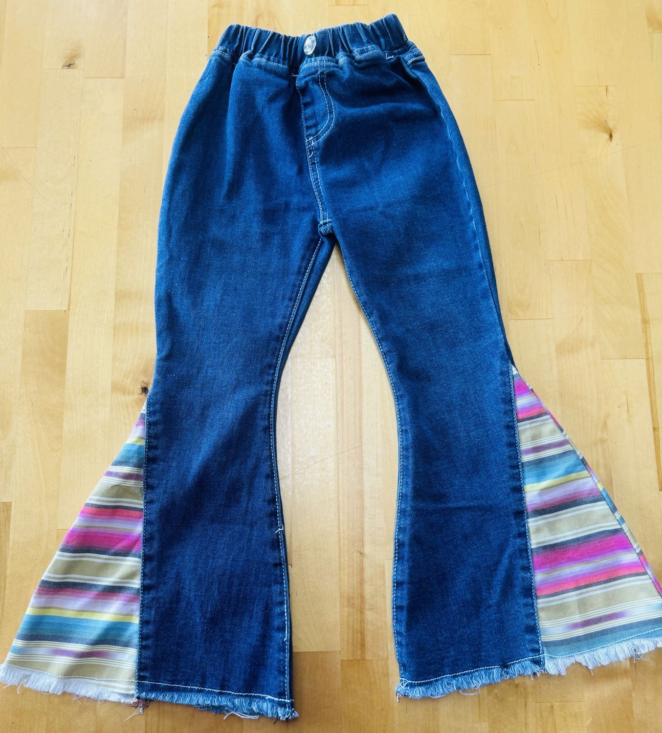 802101-450 TODDLER COWGIRL HARDWARE SERAPE BELLS
