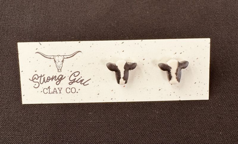 STRONG GIRL CLAY CO. BLACK &amp; WHITE COW HEAD STUDS