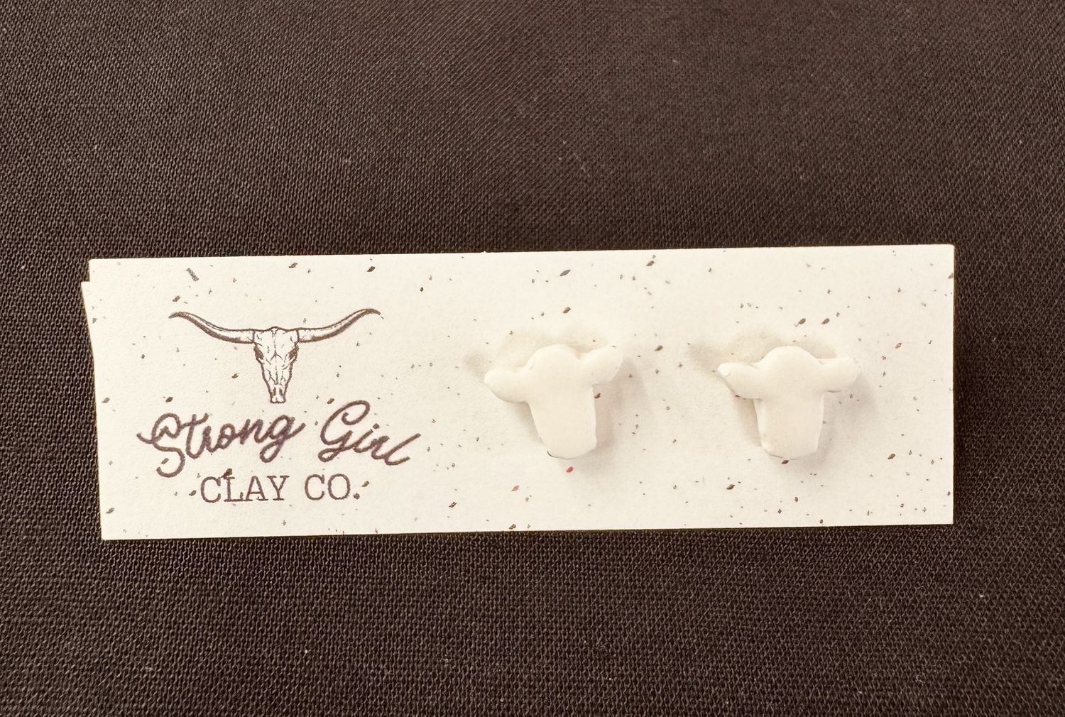 STRONG GIRL CLAY CO. WHITE COW HEAD STUDS