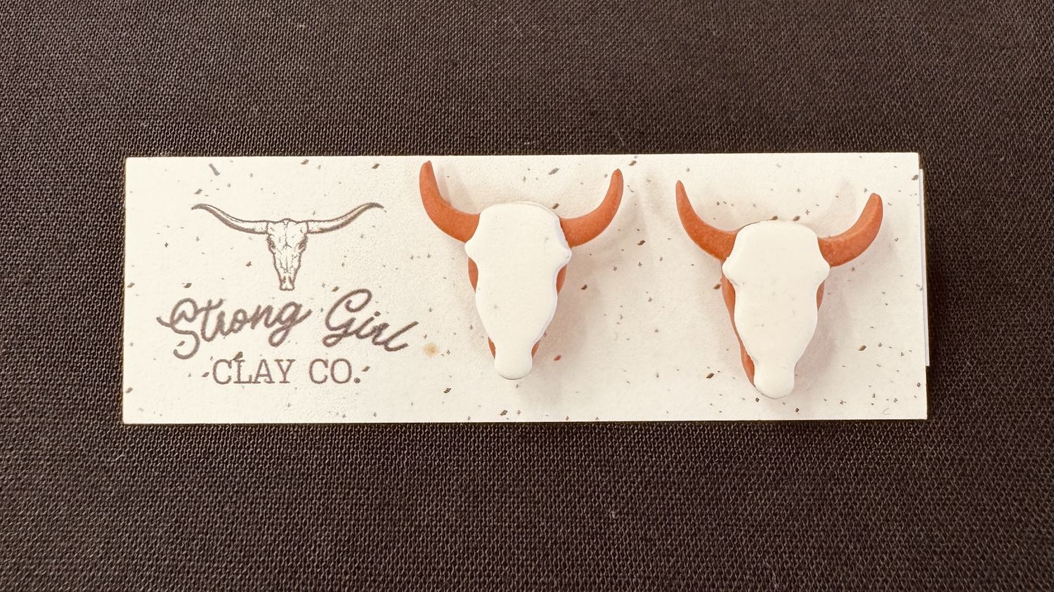 STRONG GIRL CLAY CO. RUST &amp; WHITE LONGHORN STUDS
