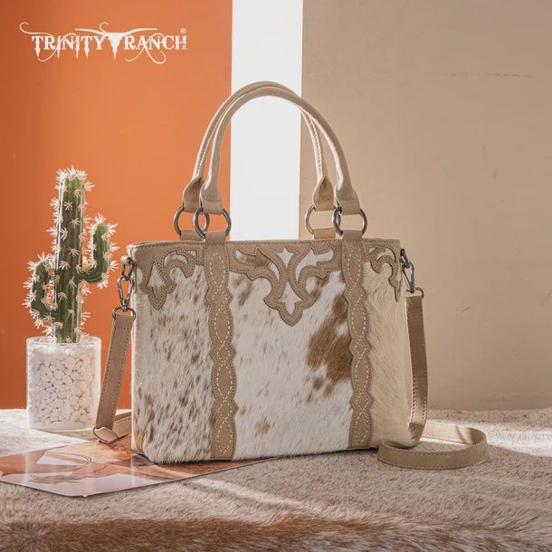 TR198G-8899 TRINITY RANCH GENUINE HAIR-ON COWHIDE COLLECTION CONCEALED CARRY TOTE - TAN