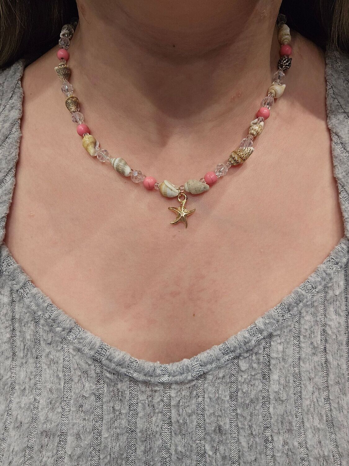 Handmade beaded shell necklace with starfish charm