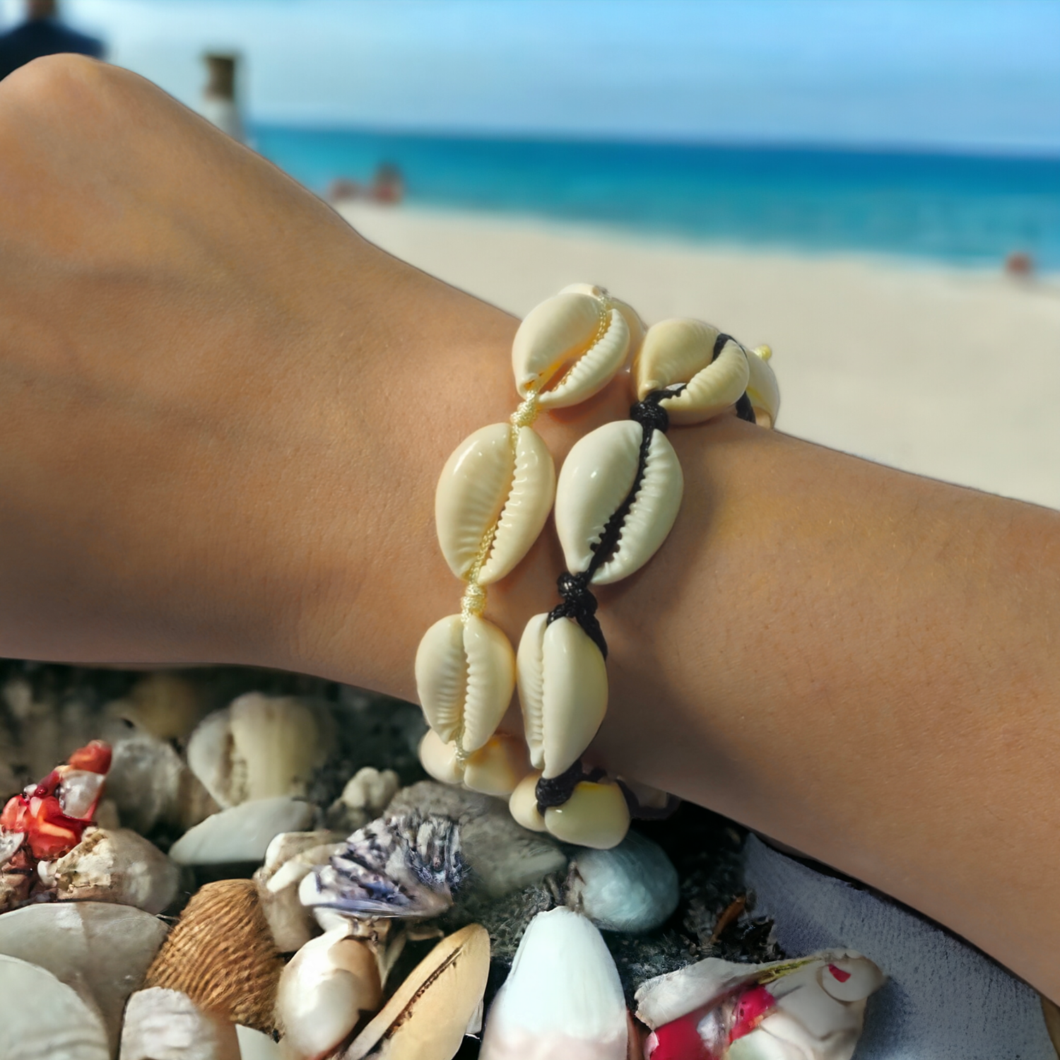 Handmade adjustable cowrie shell friendship bracelet/anklet.