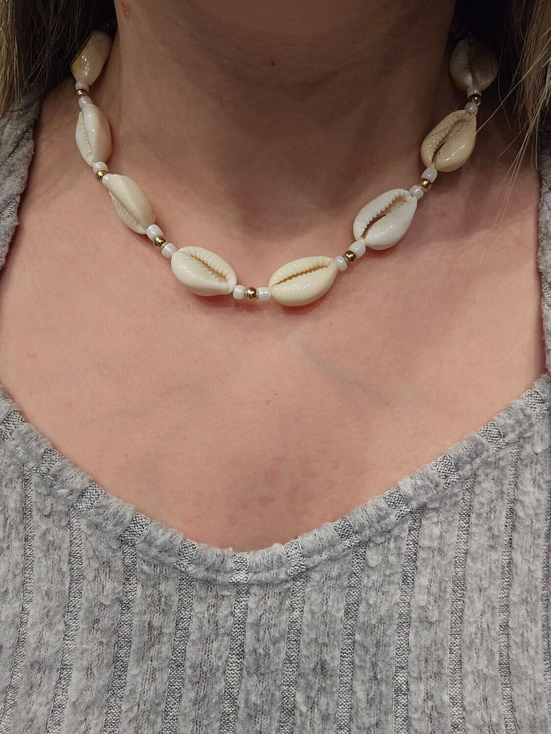 Handmade cowrie shell beaded necklace.