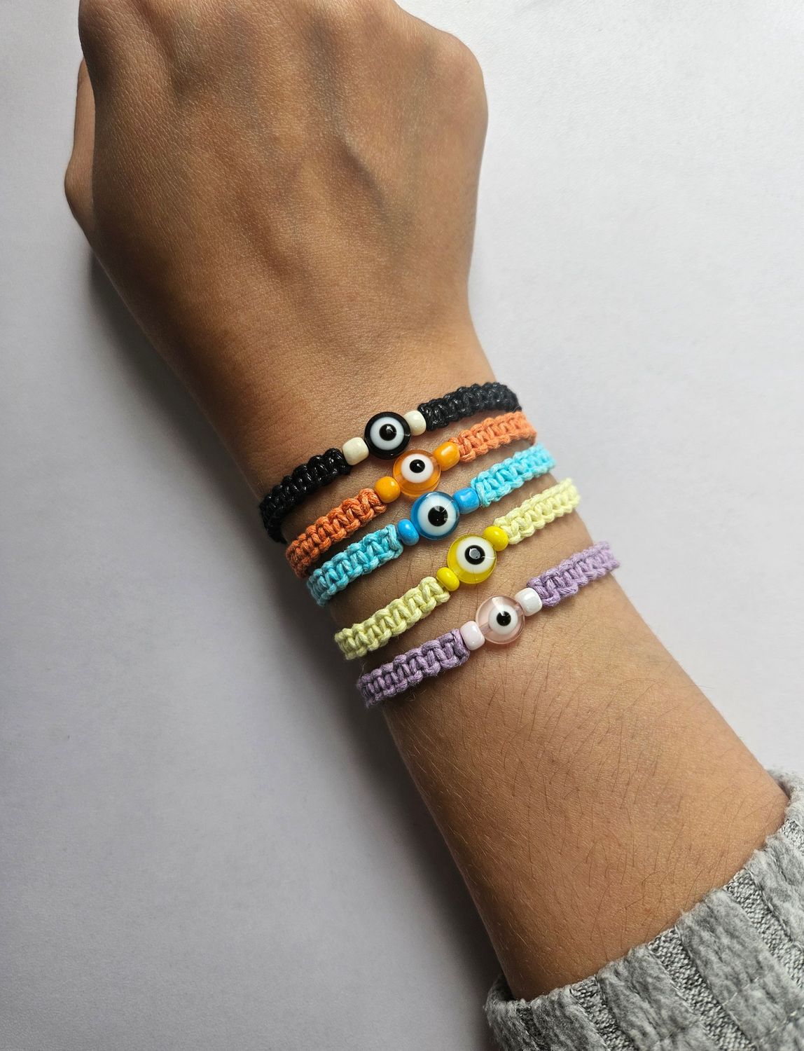 Handmade adjustable beaded evil eye bracelet/anklet.
