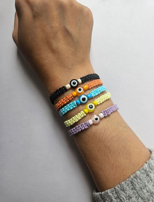 Handmade adjustable beaded evil eye bracelet/anklet.