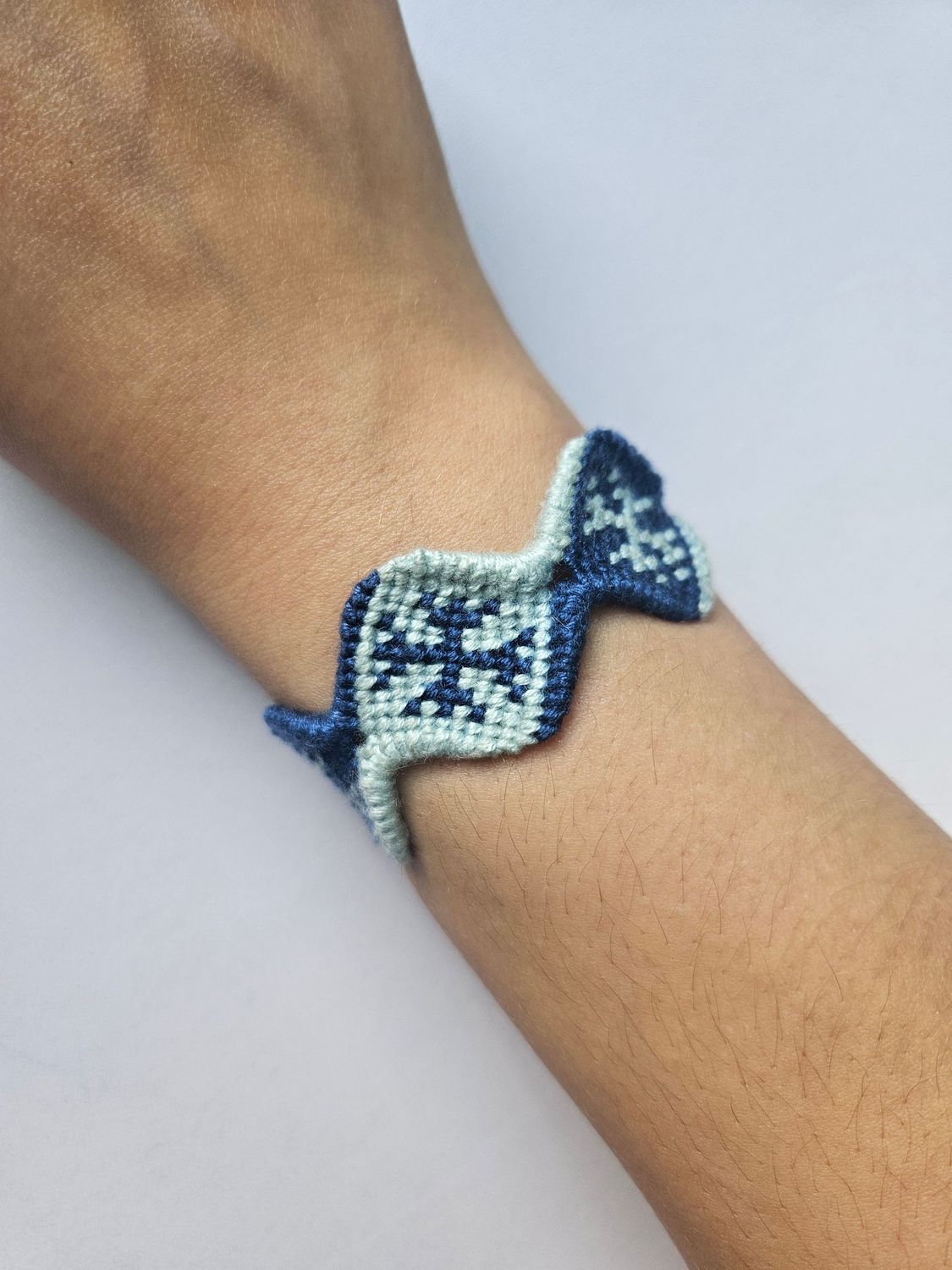 Handmade festive snowflake shaped friendship bracelet