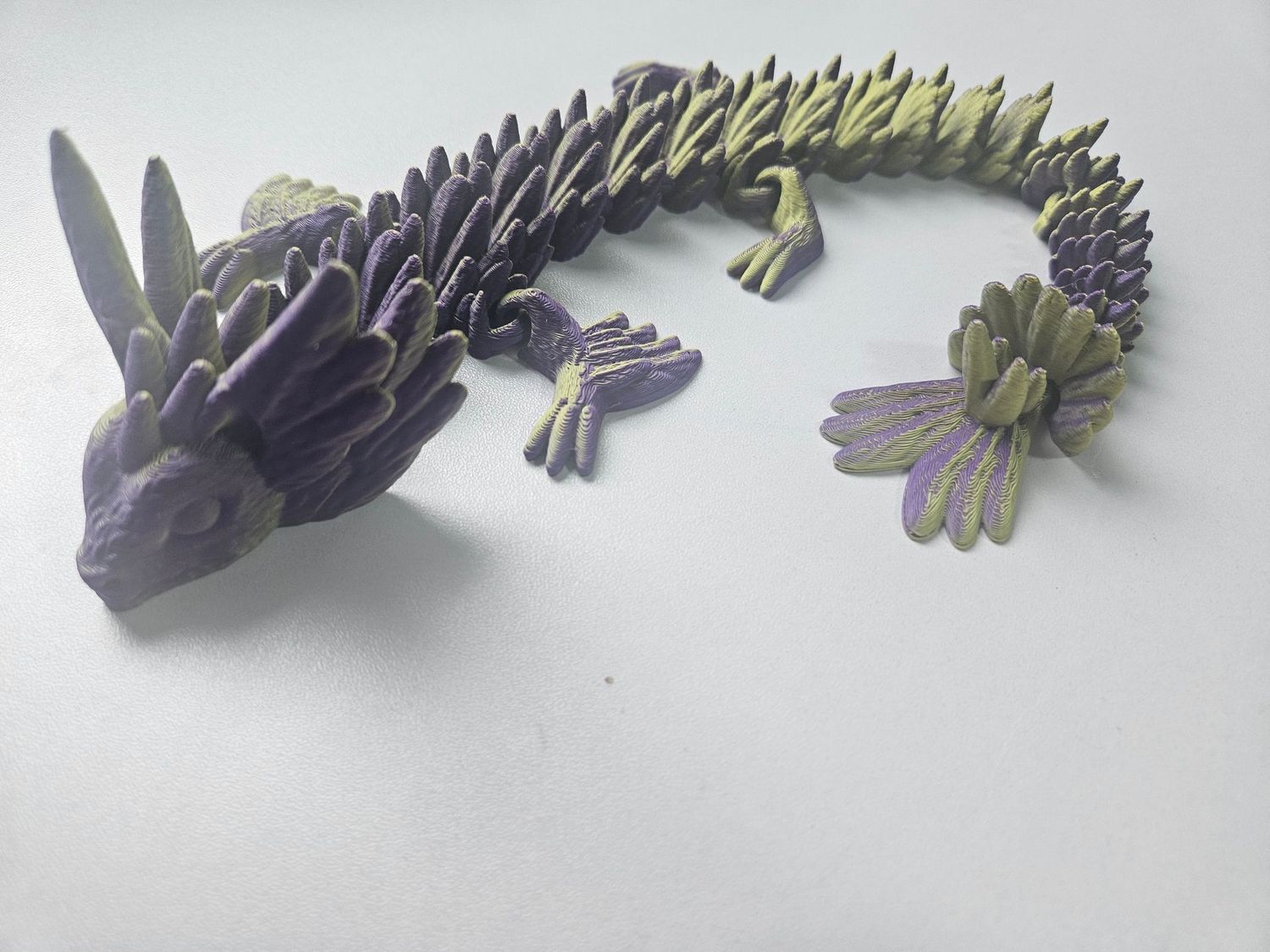 Flexible  articulated 3D printed cat dragon