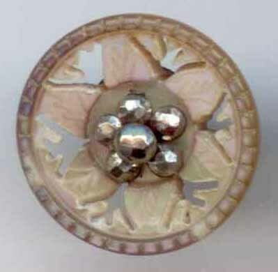 Carved Shell with Openwork and Cut Steel Center