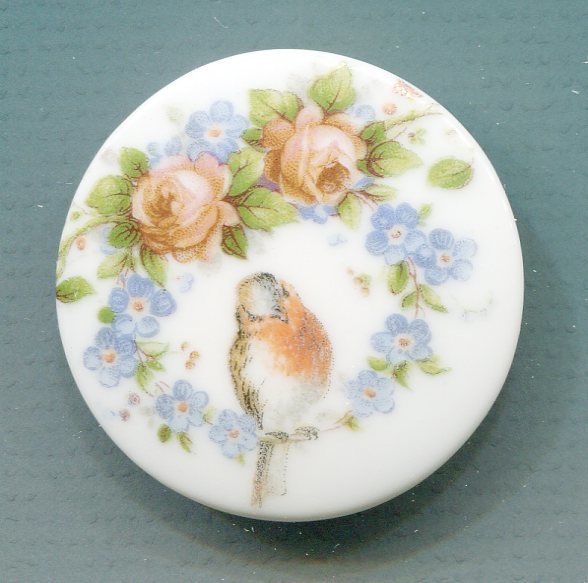 Porcelain Bird in Flowers