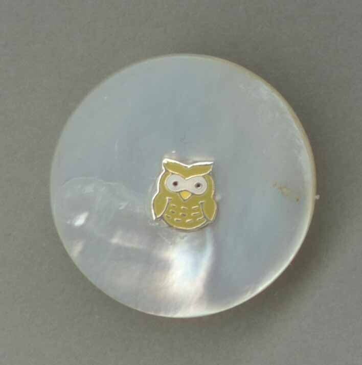 Metal Owl on Shell