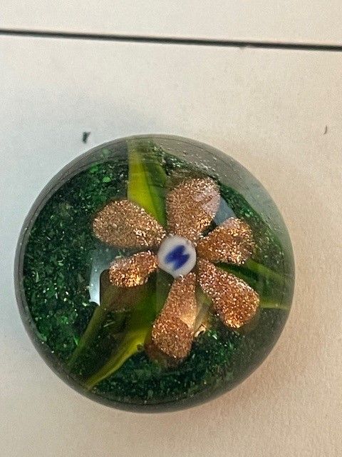 Paperweight with &quot;M&quot; in center of the Goldstone Flower