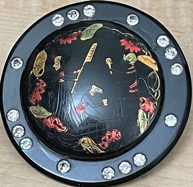 Three People Etched into Celluloid, Rhinestone Border