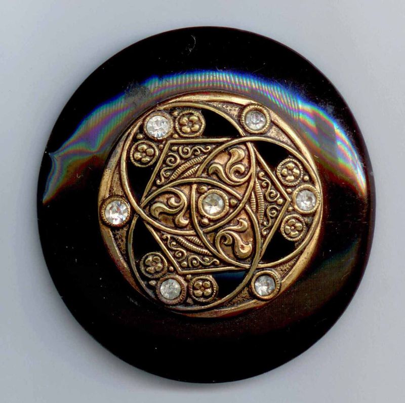 Celluloid with 2 shanks near edge