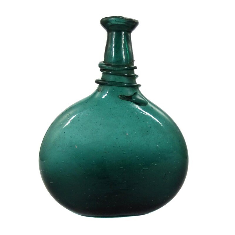Bocksbeutel, flat bottle made of green glass, Persia 19th century.