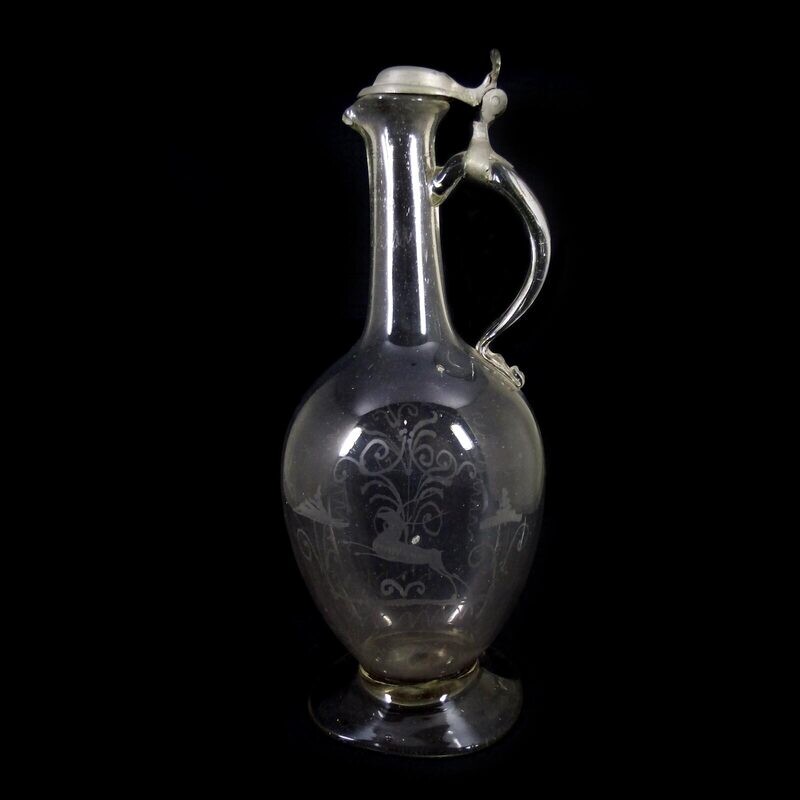 Large narrow-necked jug with pewter lid and slipped decoration, Middle German, 18th century.