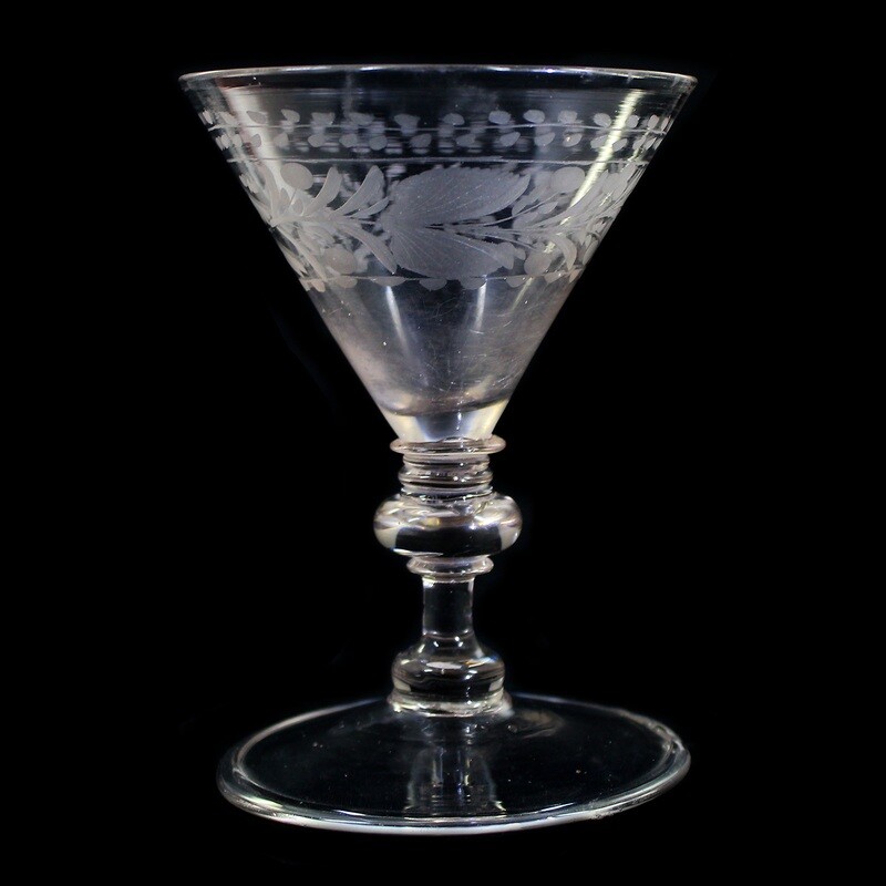 Funnel cup made of colorless glass with engraved decoration, probably Schreiberhau, 17th century.