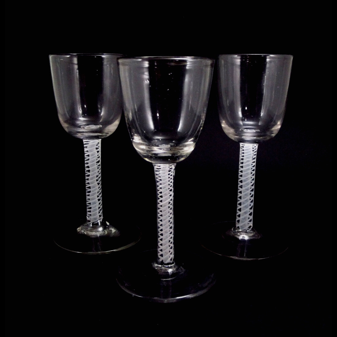 1st of 3. North German goblet glass with milk glass spiral threads, 2nd half of the 18th century.