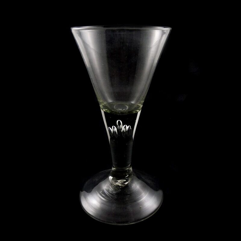 Gr. Pointed goblet with seven teardrop-shaped air beads in the shaft, Schorborn, 18th century.