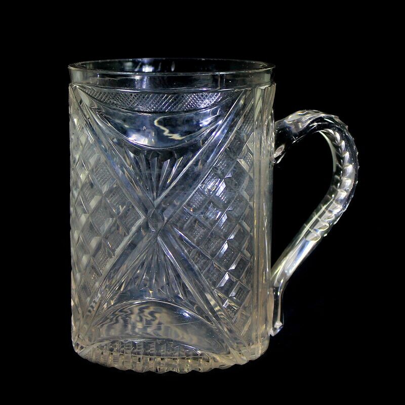 Bohemian cup with handle made of colorless glass with various cut decorations, 1st edition. 19th century
